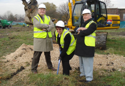 Councillor Susan Quinn cuts the first sod for the Droylsden Marina