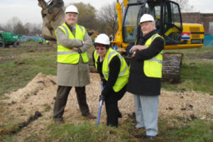 Councillor Susan Quinn cuts the first sod for the Droylsden Marina